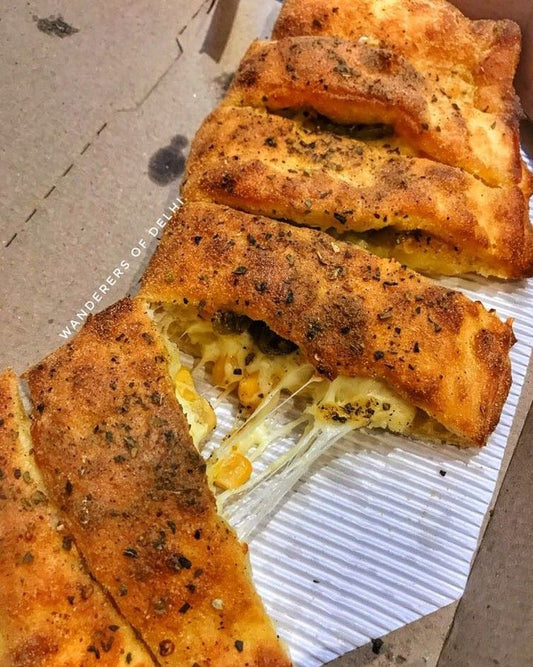 Cheese and corn stuffed garlic bread (mrunamyes cafe)